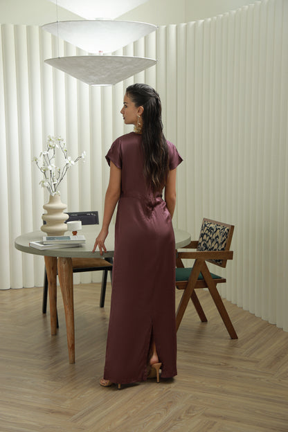 Woman in a long burgundy dress