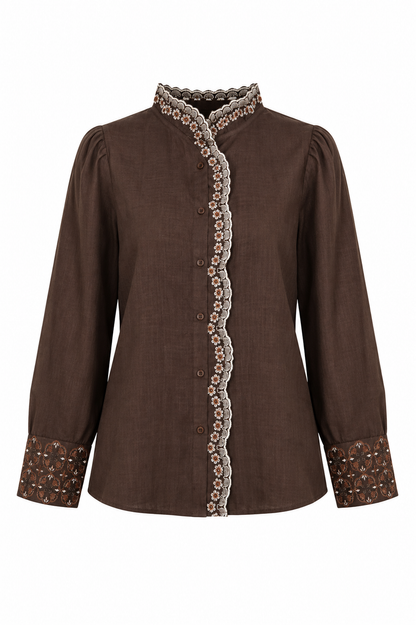 A brown long-sleeve button-up blouse with decorative scalloped trim and embroidered cuffs, shown against a plain white background.